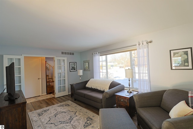 living room with dark wood-type flooring