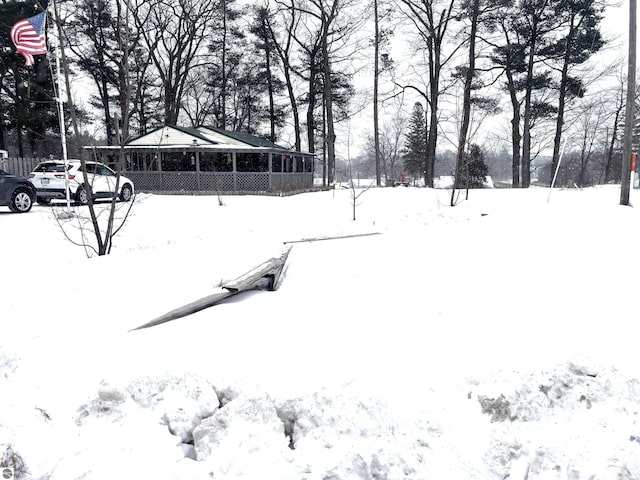 view of yard covered in snow