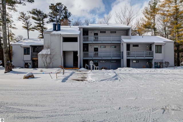 view of snow covered property