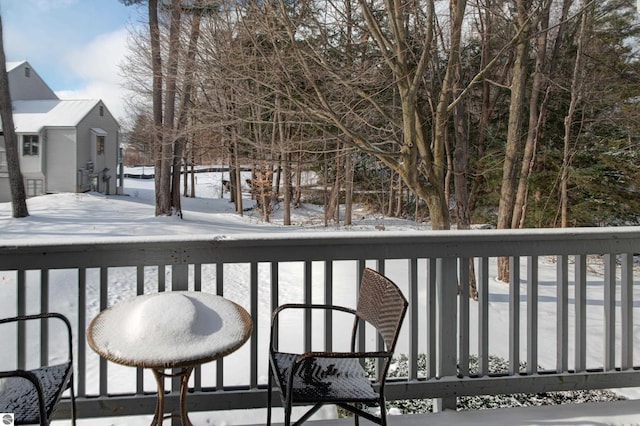 view of snow covered deck