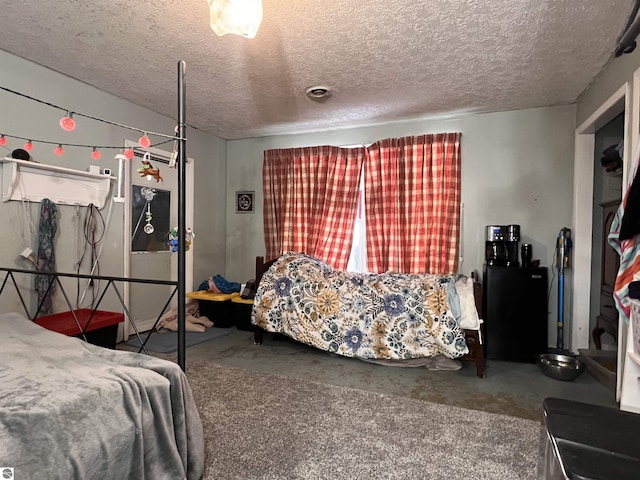 bedroom featuring a textured ceiling