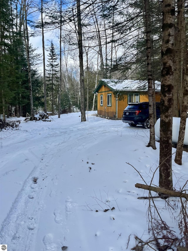 view of yard covered in snow