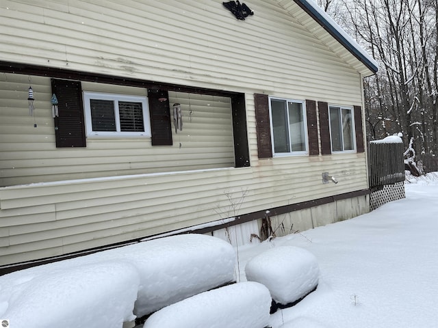 view of snow covered property