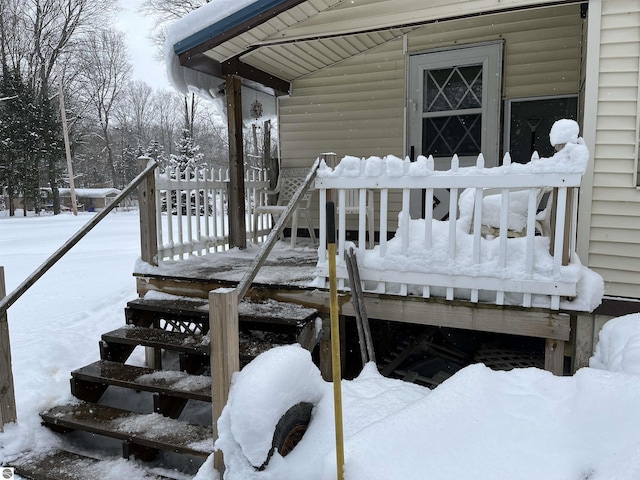 view of snow covered deck