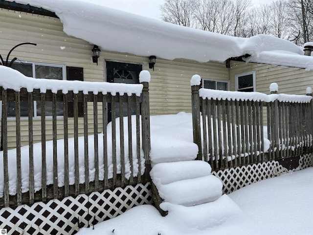 view of snow covered deck