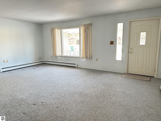 foyer entrance featuring a baseboard radiator