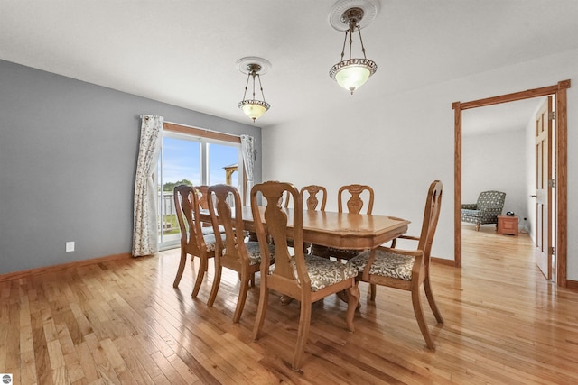 dining space featuring light hardwood / wood-style floors