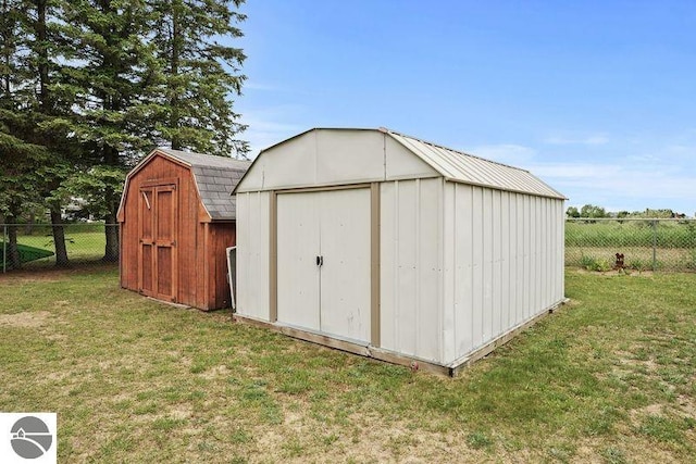 view of outdoor structure with a lawn