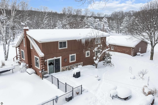 view of snow covered property