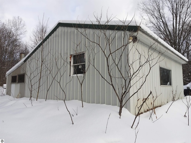 view of snow covered property