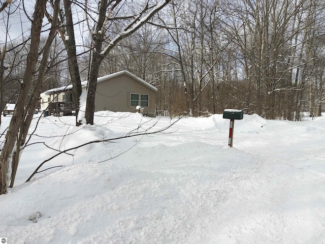 view of yard covered in snow