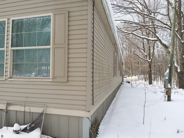 view of snow covered property