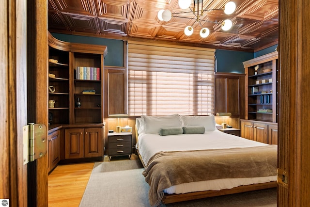 bedroom with light hardwood / wood-style floors