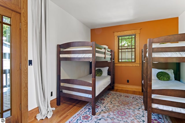 bedroom with light wood-type flooring