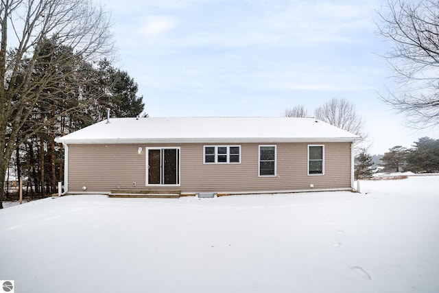 view of snow covered house