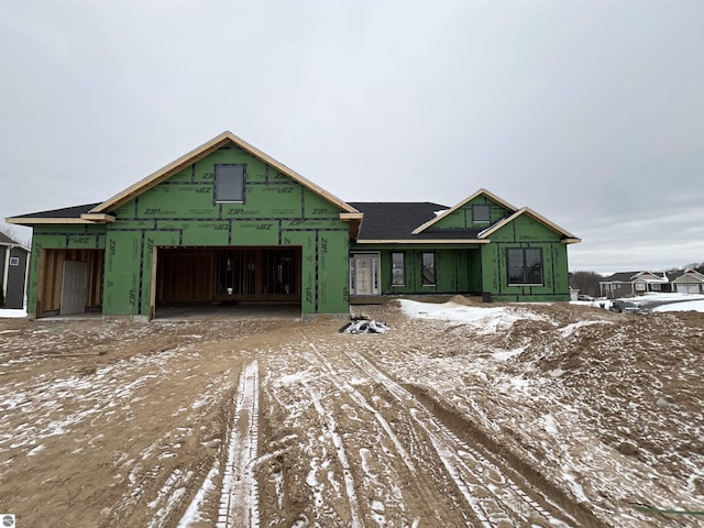 property under construction with a garage