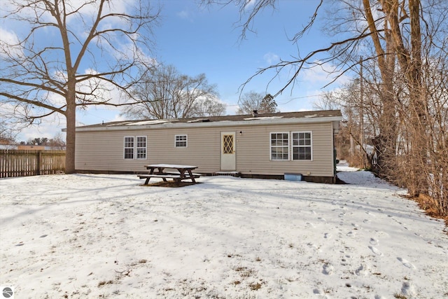 view of snow covered property