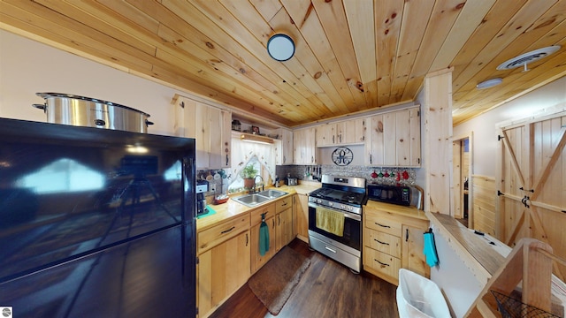 kitchen featuring sink, fridge, light brown cabinetry, stainless steel range with gas cooktop, and wooden ceiling