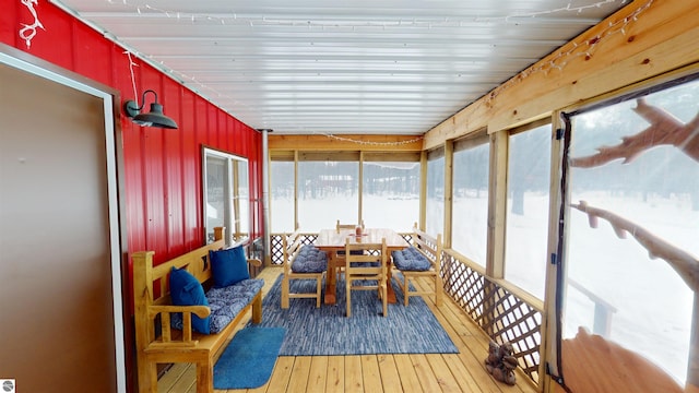 sunroom with wooden ceiling