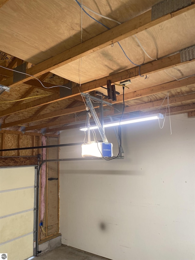 garage featuring a garage door opener