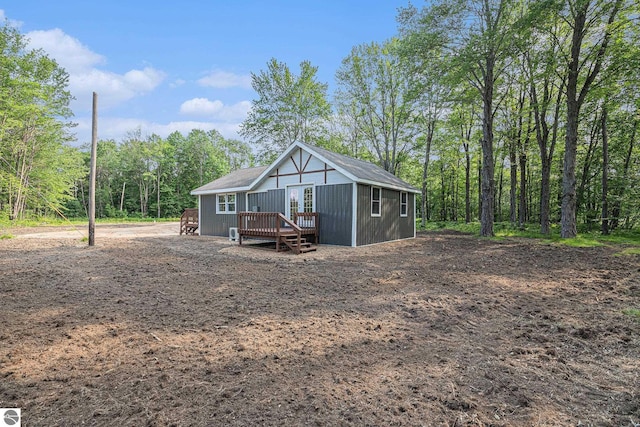 view of front of home with a wooden deck