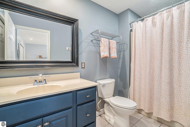 full bathroom featuring vanity, curtained shower, toilet, and tile patterned flooring