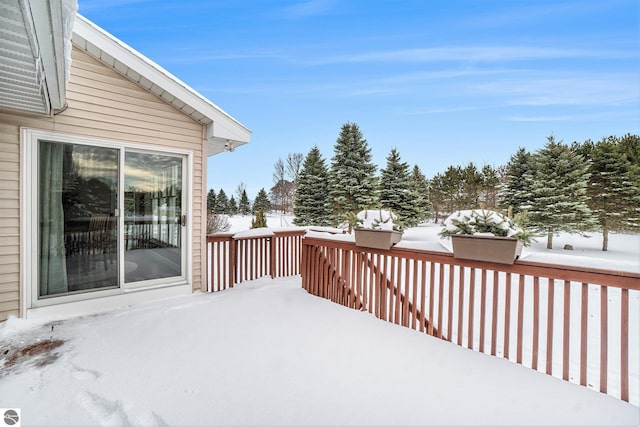 view of snow covered deck