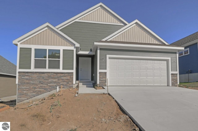 craftsman-style home with a garage