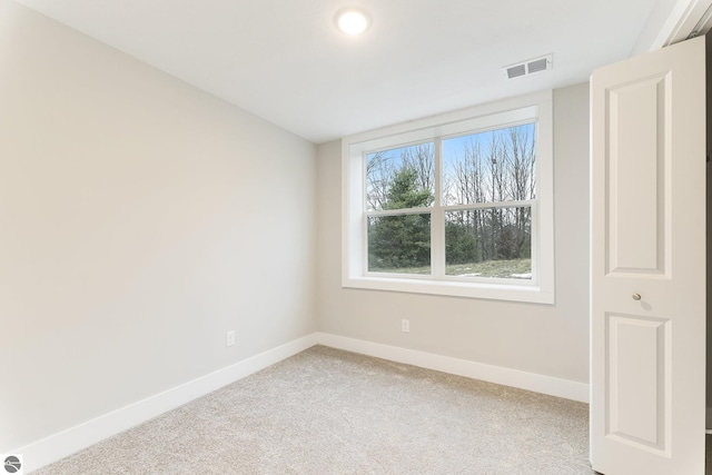 empty room featuring carpet floors