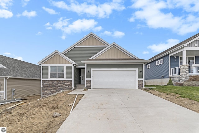 craftsman inspired home with a garage