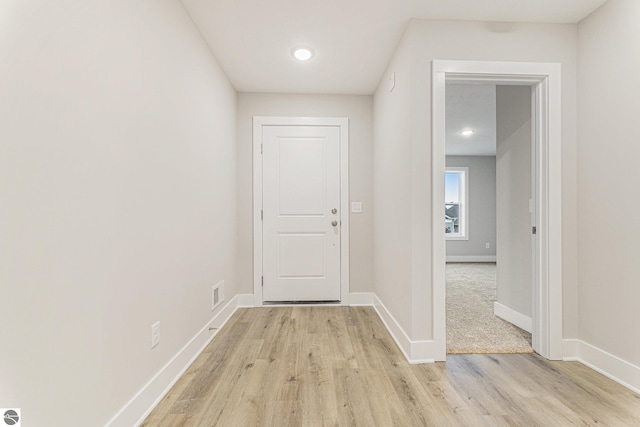 hallway featuring light wood-type flooring