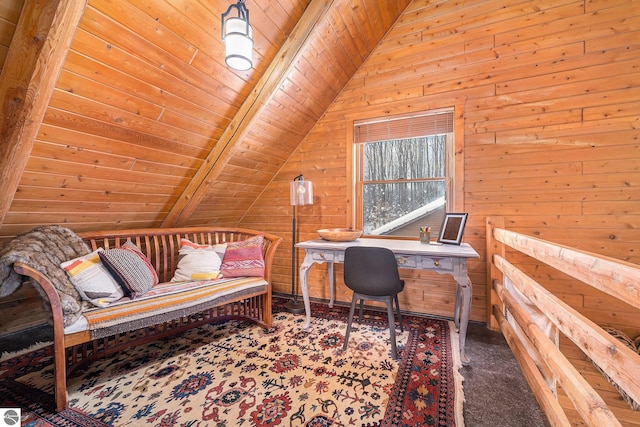 office featuring vaulted ceiling with beams, wooden walls, wooden ceiling, and carpet