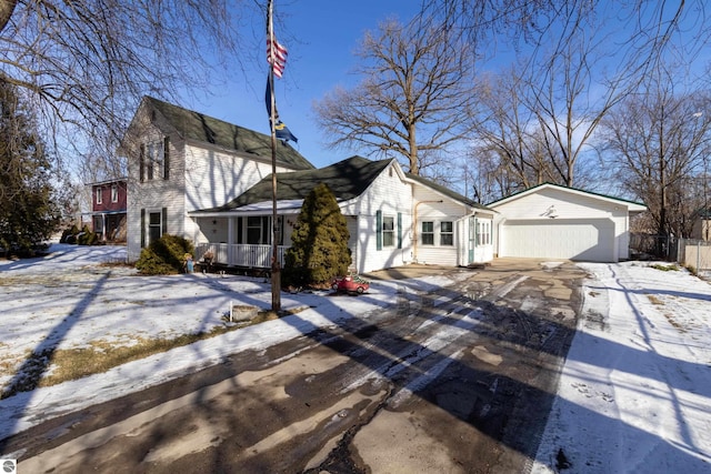 view of front of property with a garage and a porch