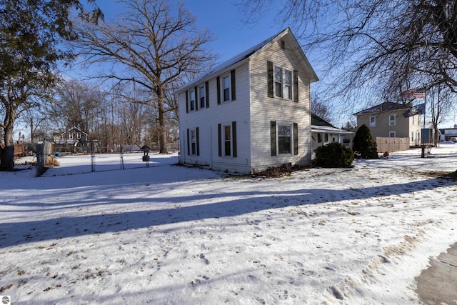 view of snow covered property