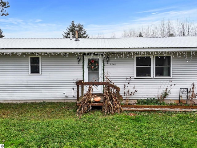 view of front of home with a front yard