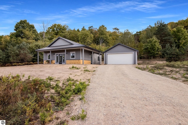 view of front of home with an outbuilding and a garage