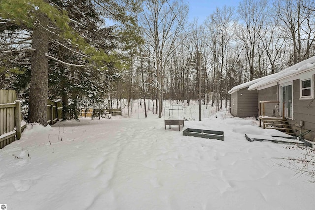 view of yard covered in snow