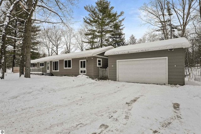 ranch-style house featuring a garage