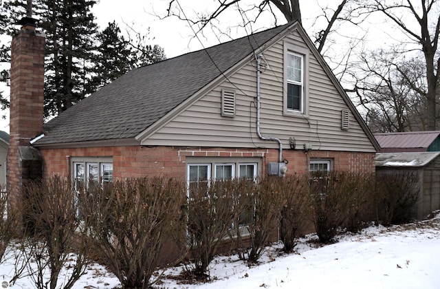 view of snow covered property