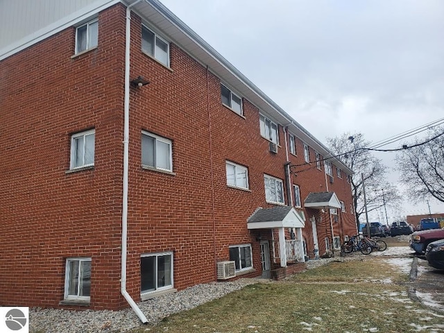 view of property featuring central AC unit