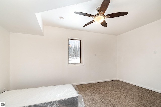 unfurnished bedroom with carpet and ceiling fan