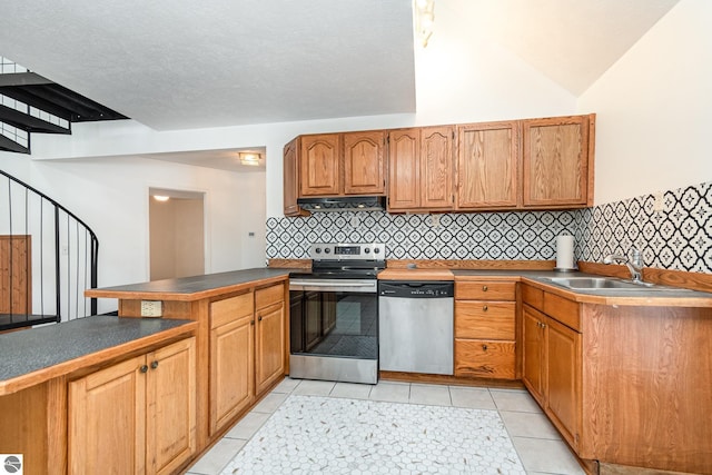 kitchen with sink, appliances with stainless steel finishes, backsplash, ventilation hood, and light tile patterned flooring