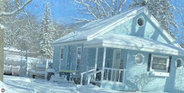 view of snow covered property