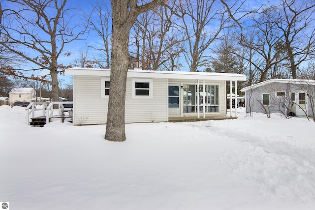 view of snow covered property