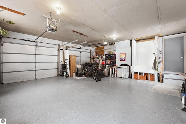 garage featuring a garage door opener