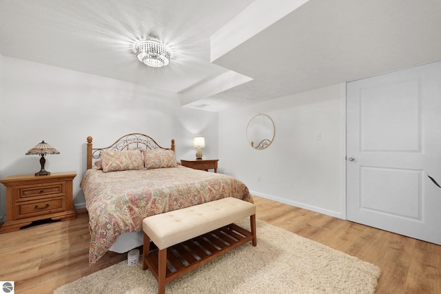 bedroom featuring light wood-type flooring