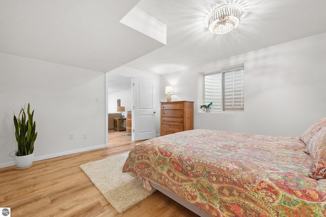 bedroom featuring wood-type flooring