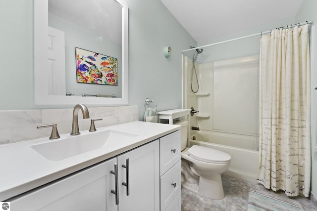 full bathroom with vanity, toilet, shower / tub combo with curtain, and decorative backsplash