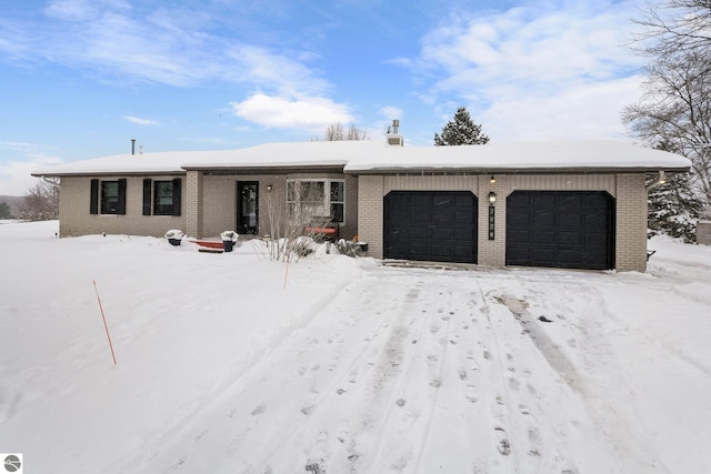 single story home with a garage