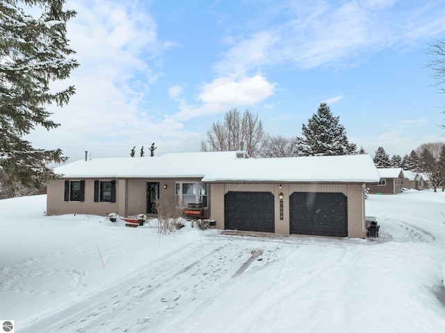 single story home with a garage